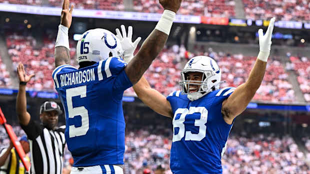 Sep 17, 2023; Houston, Texas, USA; Indianapolis Colts quarterback Anthony Richardson (5) celebrates his touchdown with tight end Kylen Granson (83) against the Houston Texans during the first quarter at NRG Stadium.